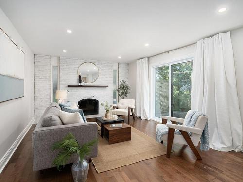 Family room - 421 Church Street, Beaconsfield, QC - Indoor Photo Showing Living Room With Fireplace