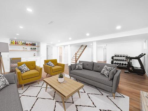 Basement - 421 Church Street, Beaconsfield, QC - Indoor Photo Showing Living Room With Fireplace