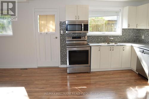 Main - 15 Browning Court, Aurora, ON - Indoor Photo Showing Kitchen With Double Sink