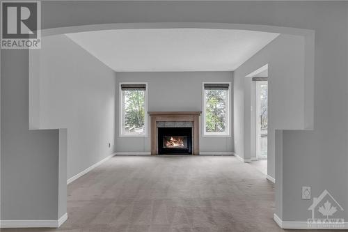 133 Hemlo Crescent, Ottawa, ON - Indoor Photo Showing Living Room With Fireplace