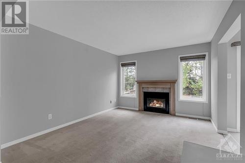 133 Hemlo Crescent, Ottawa, ON - Indoor Photo Showing Living Room With Fireplace