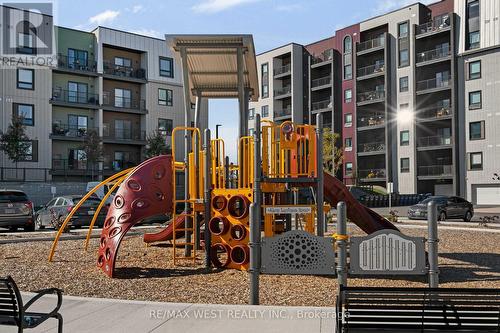 509 - 4 Spice Way, Barrie, ON - Outdoor With Balcony With Facade