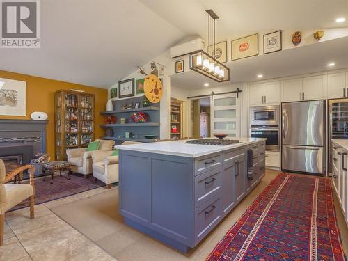 611 Burns Street, Penticton, BC - Indoor Photo Showing Kitchen With Fireplace