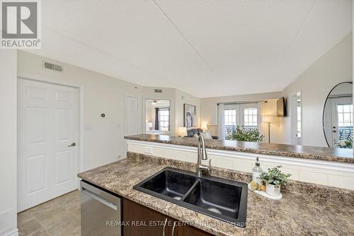 309 - 1340 Main Street E, Milton, ON - Indoor Photo Showing Kitchen With Double Sink