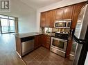 1410 - 80 Absolute Avenue, Mississauga, ON  - Indoor Photo Showing Kitchen 