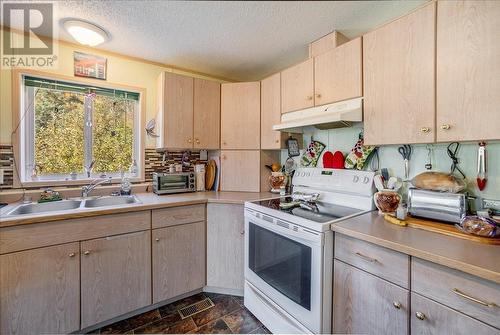 2747 Greenwood  Road, Nelson, BC - Indoor Photo Showing Kitchen With Double Sink