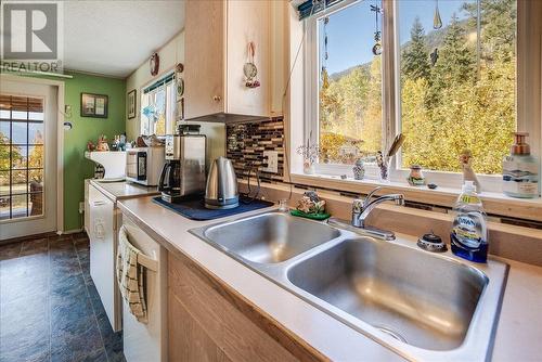 2747 Greenwood  Road, Nelson, BC - Indoor Photo Showing Kitchen With Double Sink