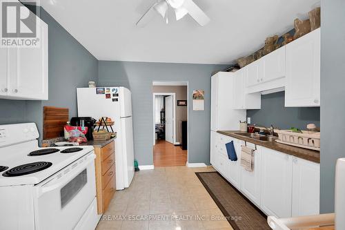 942 Upper Gage Avenue, Hamilton, ON - Indoor Photo Showing Kitchen With Double Sink