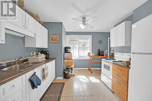 942 Upper Gage Avenue, Hamilton, ON - Indoor Photo Showing Kitchen With Double Sink