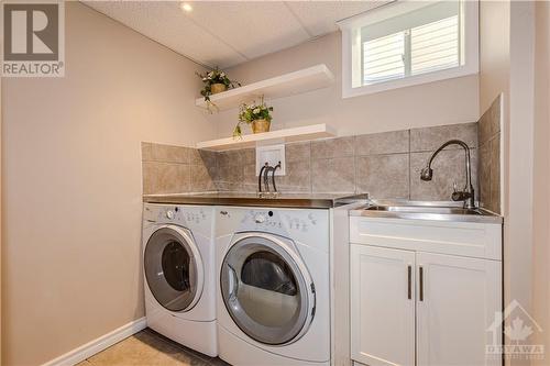 3483 River Run Avenue, Ottawa, ON - Indoor Photo Showing Laundry Room