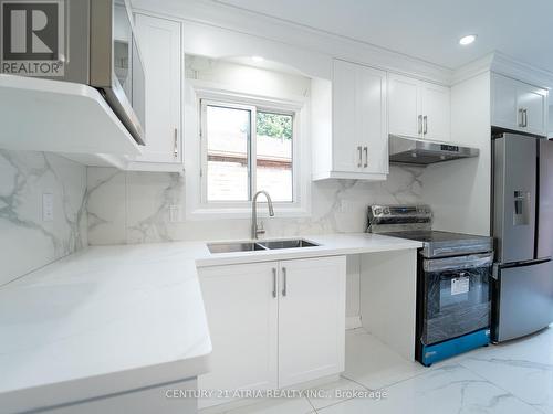 138 Fawcett Trail, Toronto, ON - Indoor Photo Showing Kitchen With Double Sink