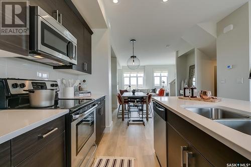 609 701 Meadows Boulevard, Saskatoon, SK - Indoor Photo Showing Kitchen With Stainless Steel Kitchen With Upgraded Kitchen