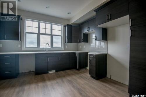 609 701 Meadows Boulevard, Saskatoon, SK - Indoor Photo Showing Kitchen