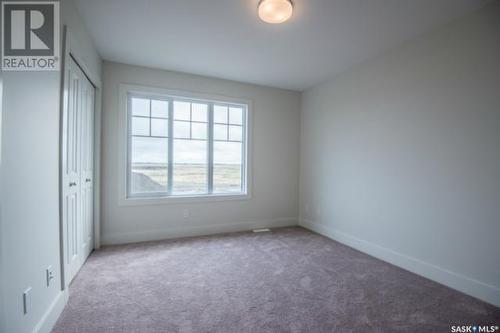 609 701 Meadows Boulevard, Saskatoon, SK - Indoor Photo Showing Other Room