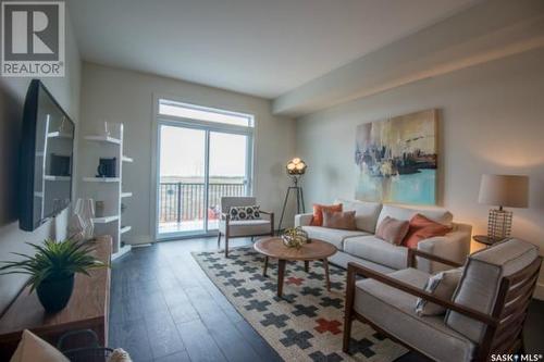 609 701 Meadows Boulevard, Saskatoon, SK - Indoor Photo Showing Living Room