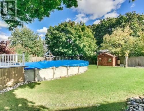 24 Cavanaugh Crescent, St. Thomas, ON - Outdoor With Above Ground Pool With Backyard