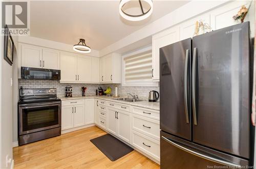 102 Jones Street, Moncton, NB - Indoor Photo Showing Kitchen With Double Sink