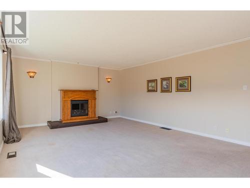 2138 Crestview  Crescent, Castlegar, BC - Indoor Photo Showing Living Room With Fireplace