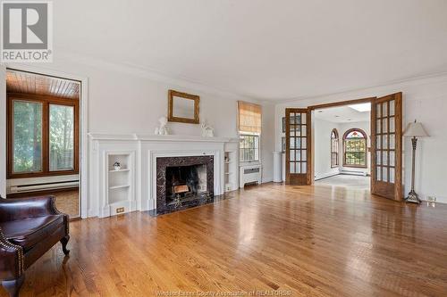 5765 Riverside Drive East, Windsor, ON - Indoor Photo Showing Living Room With Fireplace