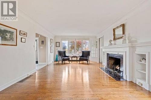 5765 Riverside Drive East, Windsor, ON - Indoor Photo Showing Living Room With Fireplace