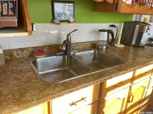 623 J Avenue S, Saskatoon, SK - Indoor Photo Showing Kitchen With Double Sink