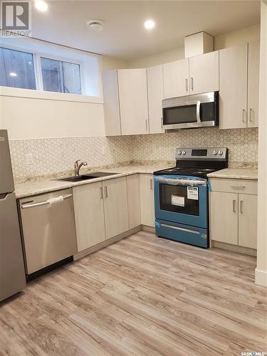 1062 Kloppenburg Bend, Saskatoon, SK - Indoor Photo Showing Kitchen With Stainless Steel Kitchen With Upgraded Kitchen