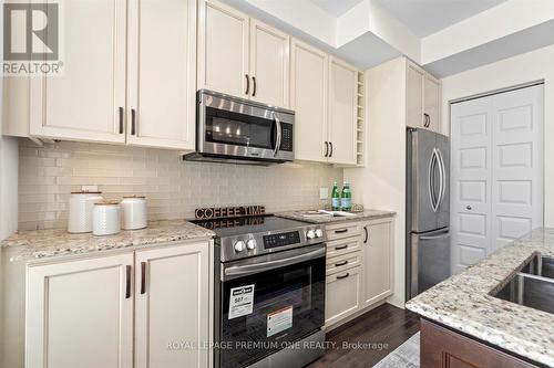 36 - 8169 Kipling Avenue, Vaughan, ON - Indoor Photo Showing Kitchen With Upgraded Kitchen