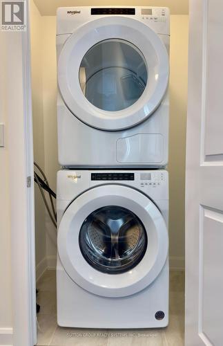 1010 - 3200 William Coltson Avenue, Oakville, ON - Indoor Photo Showing Laundry Room