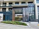 1010 - 3200 William Coltson Avenue, Oakville, ON  - Outdoor With Balcony With Facade 