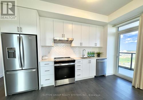 1010 - 3200 William Coltson Avenue, Oakville, ON - Indoor Photo Showing Kitchen With Upgraded Kitchen