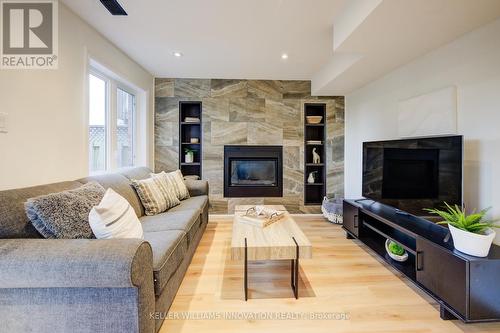 103 Bloomington Drive, Cambridge, ON - Indoor Photo Showing Living Room With Fireplace