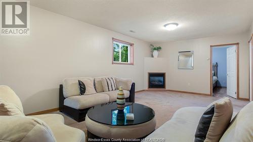 671 Eugenie, Windsor, ON - Indoor Photo Showing Living Room With Fireplace