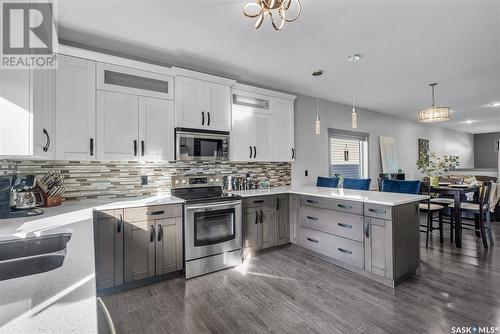 558 Evergreen Boulevard, Saskatoon, SK - Indoor Photo Showing Kitchen With Stainless Steel Kitchen With Double Sink With Upgraded Kitchen