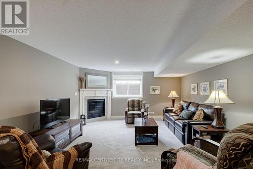 7 Drake Court, Strathroy-Caradoc (Sw), ON - Indoor Photo Showing Living Room With Fireplace