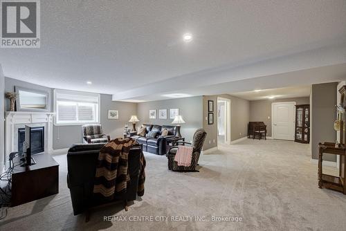 7 Drake Court, Strathroy-Caradoc (Sw), ON - Indoor With Fireplace