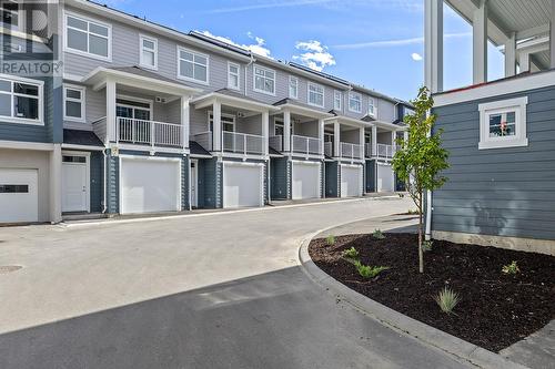 Rear laneway - 5300 Main Street Unit# 120, Kelowna, BC - Outdoor With Facade