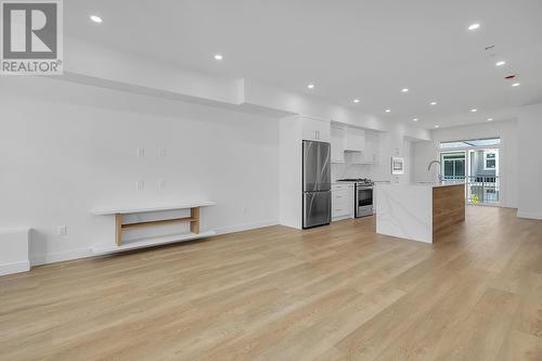 Luxury vinyl plank flooring - 5300 Main Street Unit# 120, Kelowna, BC - Indoor Photo Showing Kitchen