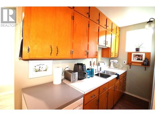 1834 Wilmes  Lane, Trail, BC - Indoor Photo Showing Kitchen With Double Sink