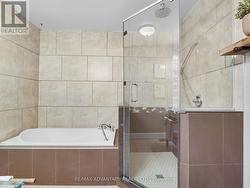 Updated bathroom with new bathroom tile - 