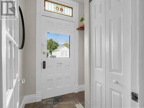 Entrance way with closet and stained glass - 80 Edward Street, London, ON - Indoor Photo Showing Other Room