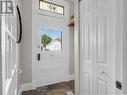 Entrance way with closet and stained glass - 80 Edward Street, London, ON  - Indoor Photo Showing Other Room 