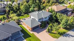 Aerial view of this amazing property. High quality interlock driveway and walkway.  Professionally landscaped. - 