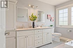 Main 5-piece bathroom featuring quartz countertop - 