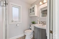 3-piece bath on main floor, off sunroom and office - 