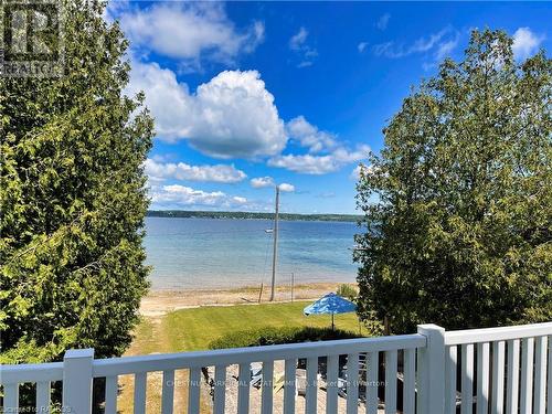 111 Sunset Boulevard, Georgian Bluffs, ON - Outdoor With Body Of Water With Deck Patio Veranda With View