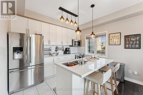 102 Ferris Square, Clarington, ON - Indoor Photo Showing Kitchen With Stainless Steel Kitchen With Double Sink With Upgraded Kitchen