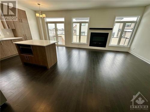 724 Odyssey Way, Ottawa, ON - Indoor Photo Showing Living Room With Fireplace