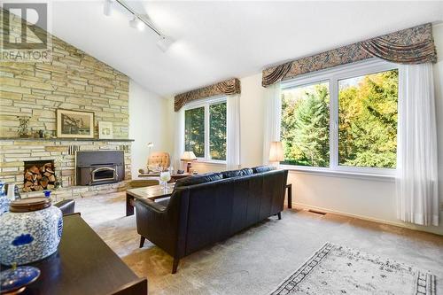 1134 Hallecks Road W, Brockville, ON - Indoor Photo Showing Living Room With Fireplace