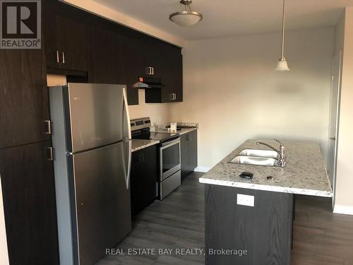 1A - 155 Thomas Slee Drive, Kitchener, ON - Indoor Photo Showing Kitchen With Stainless Steel Kitchen With Double Sink