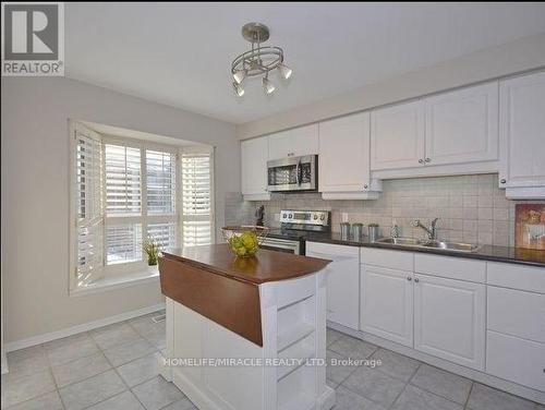 87 Gypsy Rose Way, Toronto, ON - Indoor Photo Showing Kitchen With Double Sink